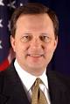 Michael D. Brown - 220px-Michael_D._Brown,_official_FEMA_photo_portrait,_2003