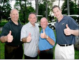 ... Blackhawks prospect Michael Blunden join André Lacroix in giving the thumbs up to mark the 30th and final Lacroix Source For Sports Golf Tournament. - Lacroix_golf_2006c
