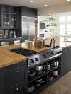 Stove top with butcher block. Love the island stove with lots of ...