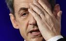 Nicolas Sarkozy holds