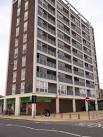 Abbey Wood Co-Operative Supermarket. Below a tall block of flats on Eynsham - via Daymix