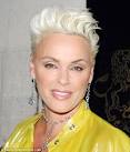 Rejuvenated: Brigitte Nielsen looks fresh-faced and revived in London last ... - article-1038531-0210FB3200000578-976_468x562_popup