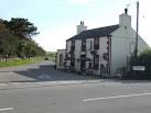 The Speculation Inn. A pub and inn by the B4320 west of Hundleton - via Daymix