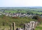 View from Gop Hill. The village of Trelawnyd in the centre. - via Daymix