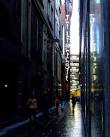 A dark lane,with a lighthouse - via Daymix