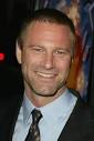 http://backseatcuddler.com/wp-content/uploads/2009/02/aaroneckhart.jpg