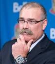 Paul MacLean speaks with the media after being named head coach of the ... - macleanstache