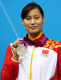 Silver medallist Ying Lu of China poses on the podium during the medal ceremony for the \u0026quot;In China we\u0026#39;re used to study, study and train, train and then rest ... - 30ying-lu-china-swimmer