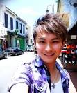 William Tan wearing,