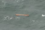 Officials: Bodies, Debris Found Floating in Waters Near Site Where.