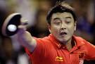 Wang Hao of China plays against Ju Lin of the Dominican Republic during ... - f04da2db14840f33886b42