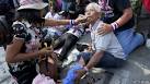 BBC News - Thailand crisis: Blast targets Bangkok protest rally