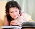 woman with cat, reading