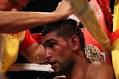 Despite a bruising encounter, Khan is eager to face victor Lamont Peterson ... - 2011121417750817580_3