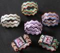 http://www.swcoloradowildflowers.com/Betty's_Beading_Photos/Beaded-Napkin-Rings.jpg