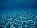 Sunlight Reflects on the Sea Floor Through Crystal Clear Blue ...
