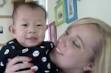 Jones is holding Shui-man, an orphaned Chinese boy now being adopted by her ... - amber-jones_China