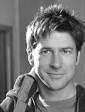 Actor: Joe Flanigan. Name: John Sheppard (Dom)