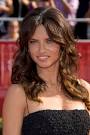 Adriana Lima sports long,