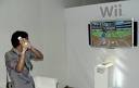  How do you change to a right handed position in Wii Sports golf?