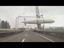 Watch - Updated (4): Taiwan plane with 58 aboard crashes in Taipei.