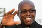 Former athlete Carl Lewis poses for photographers as he arrives for an award ... - carl_lewis_041111