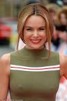 Britains Got Talents Amanda Holden braless in khaki dress at.