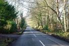 Blackberry Road. Up-market houses on the left, woods or open parkland on the - via Daymix