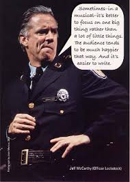 Officer Lockstock, Jeff McCarthy, warned us on the dangers of too much exposition. - copcard