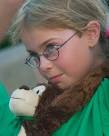 Megan with the rally monkey. She was awarded player of the game for a nice