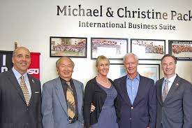 From left, Dean Michael Cunningham, College of Business; Dean Paul Wong, College of Arts and Letters; Christine Pack; Michael Pack; SDSU President Elliot ... - str-101411-pack