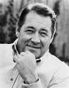 Barry Corbin portrays Maurice