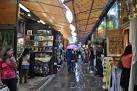 A very wet day in London and people are cuddling up under their umbrellas to - via Daymix