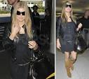 http://www.cooldesignerhandbags.com/wp-content/uploads/2008/03/fergie-and-her-cartier-marcello-handbag.jpg