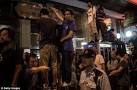 Hong Kong protesters attacked by shop owners as they are losing.