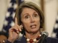 Nancy Pelosi gestures during a