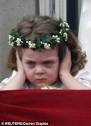 Ssshhh: Bridesmaid Grace van Cutsem covers her ears during the fly past ...