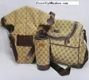 http://www.emillie.net/lib/gallery/Gucci_real_leather_baby_carrier_bottle_holder_baby.jpg