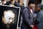artist Ai Weiwei holds a