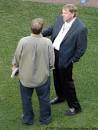 Cubdom Photos: Jim Hendry talks with Buster Olney