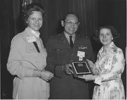 SWE President Carolyn Phillips (left) and Barbara Jaun (right) present speaker Colonel Max Janairo with an award at the 1975 Society of Women Engineers ... - av2541_PhillipsJanairo.preview