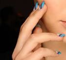 Chunky Braids, Sharp Eyeliner and Graphic Nail Art At Ruffian
