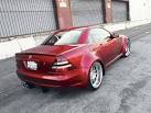 http://image.eurotuner.com/f/9208350/0607eurp_06z%252B1999_Mercedes_Benz_SLK_230%252BRear_Side_Parked.jpg