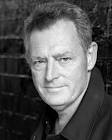 and trained at RADA.