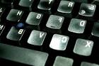 Black computer keyboard public - via Daymix