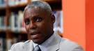 Carl Lewis speaks during a