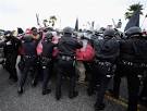 U.S. News - Occupy disrupts West Coast ports; arrests in NYC, Houston