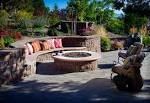 high round fireplace made of the stone having unique shape in grey ...