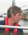 Andy Fox master boatbuilder Solar Navigator team member - andy_fox_catamaran_docking