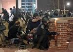 Chief calls shooting of two officers in Ferguson an ambush.